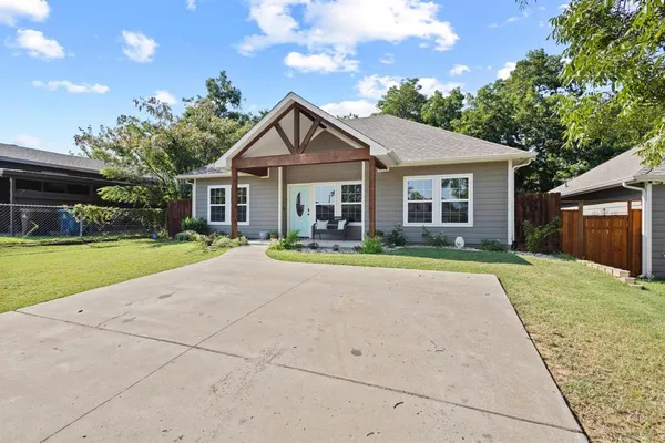 a house view with a garden space