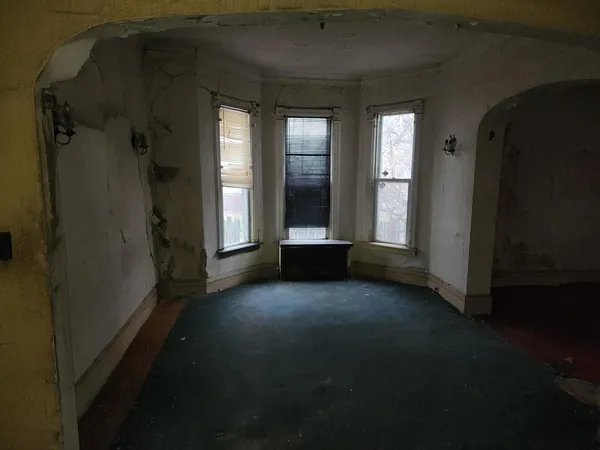 a view of gallery with windows