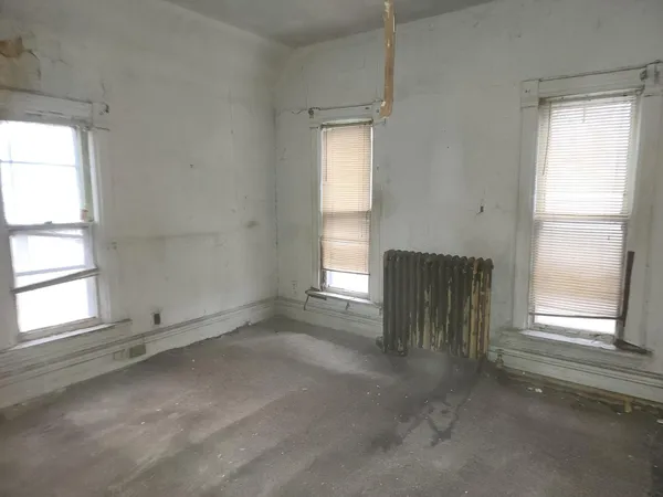 an empty room with windows