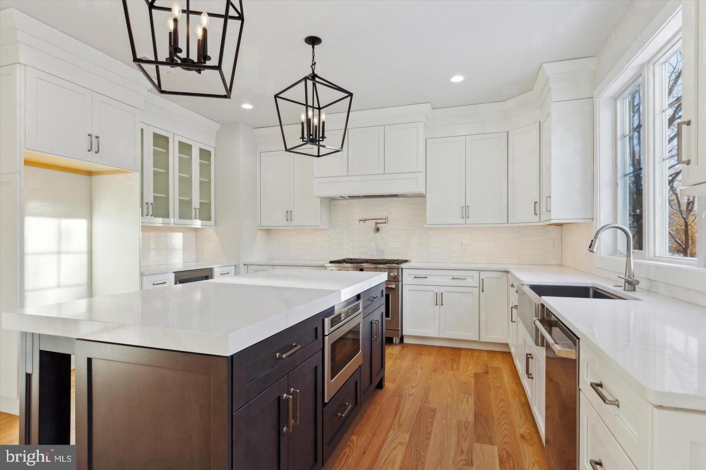825 C Morris Road Lansdale, PA 19446 - Photo 4 of 8 a kitchen with a sink stove and cabinets