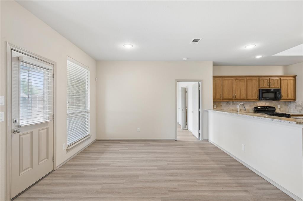 10205 Point Lobos Trail Fort Worth, TX 76177 - Photo 13 of 29 a view of a kitchen from the hallway