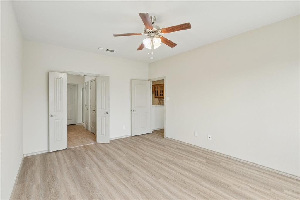 10205 Point Lobos Trail Fort Worth, TX 76177 - Photo 15 of 29 a view of empty room with wooden floor