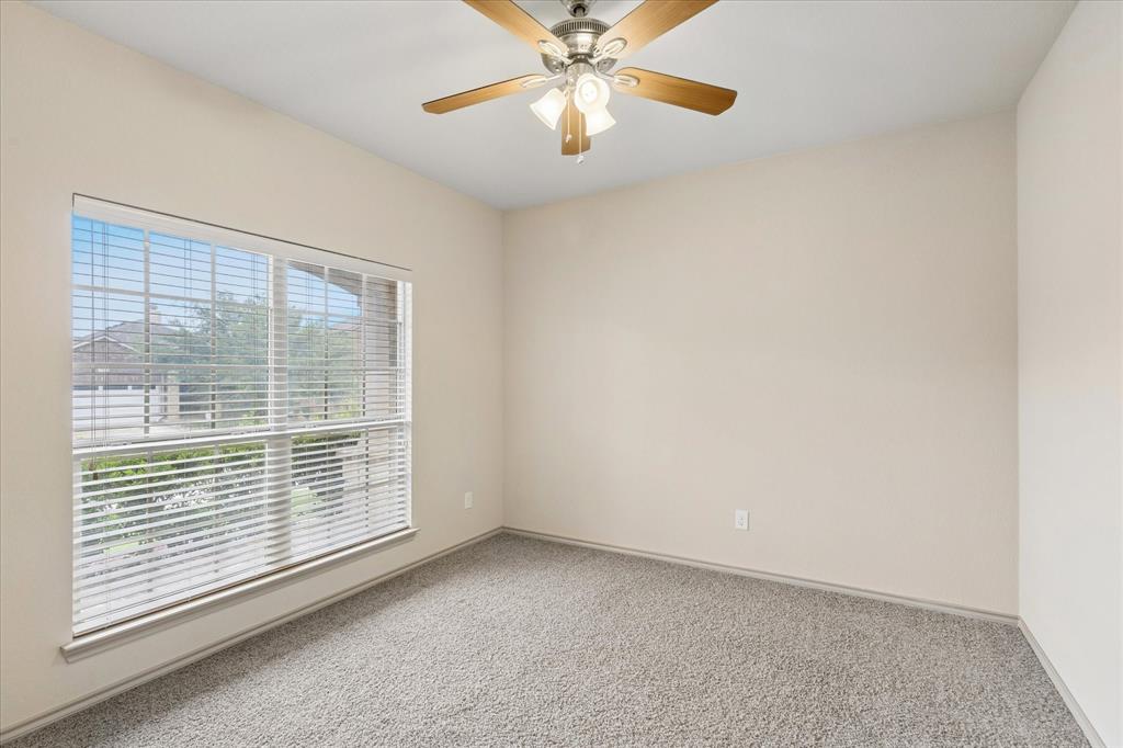 10205 Point Lobos Trail Fort Worth, TX 76177 - Photo 17 of 29 a view of an empty room with a window