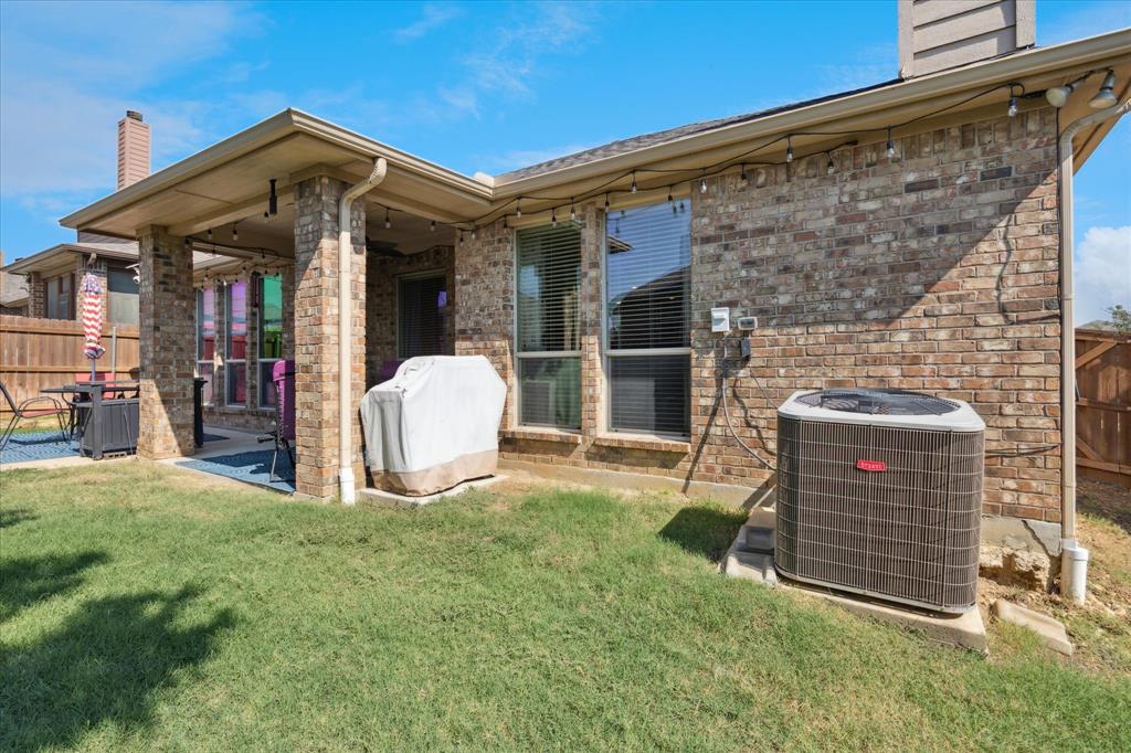 10205 Point Lobos Trail Fort Worth, TX 76177 - Photo 27 of 29 a front view of a house with a yard