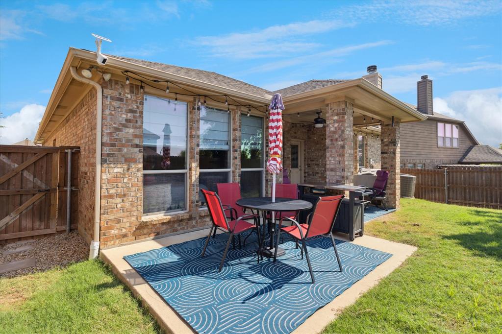 10205 Point Lobos Trail Fort Worth, TX 76177 - Photo 28 of 29 a view of a house with backyard porch and sitting area