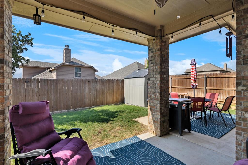 10205 Point Lobos Trail Fort Worth, TX 76177 - Photo 29 of 29 a view of a chairs and table in the patio