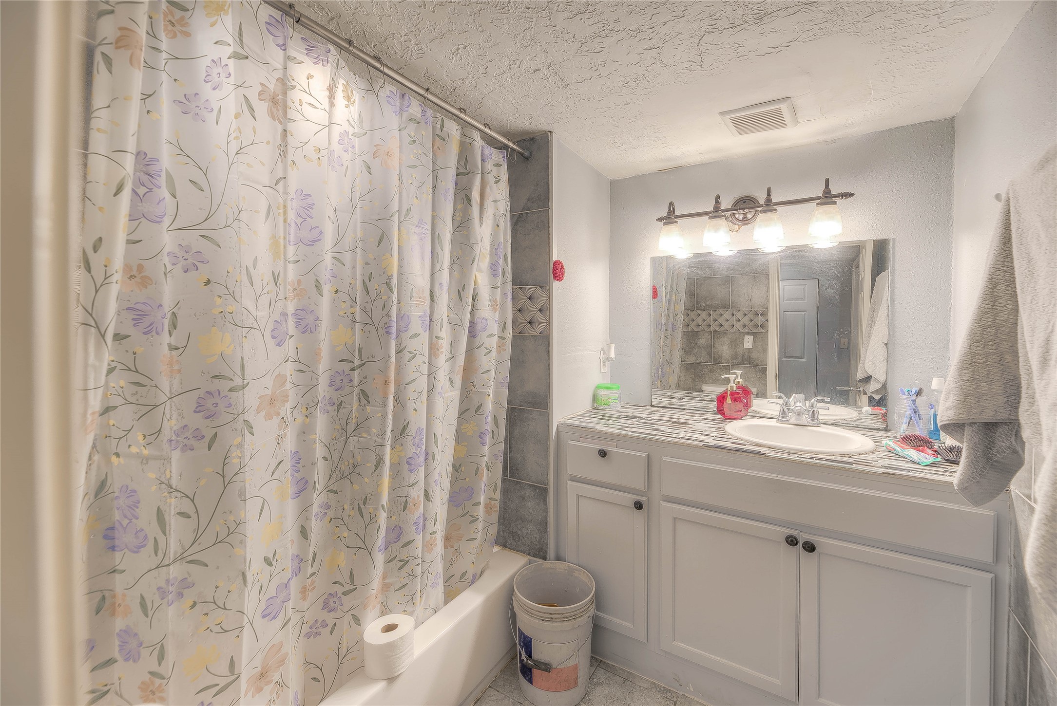 713 Garrett Road Livingston, TX 77351 - Photo 14 of 40 a bathroom with a sink and a mirror