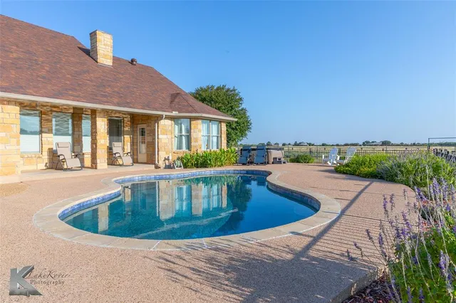 a view of outdoor space yard swimming pool and patio
