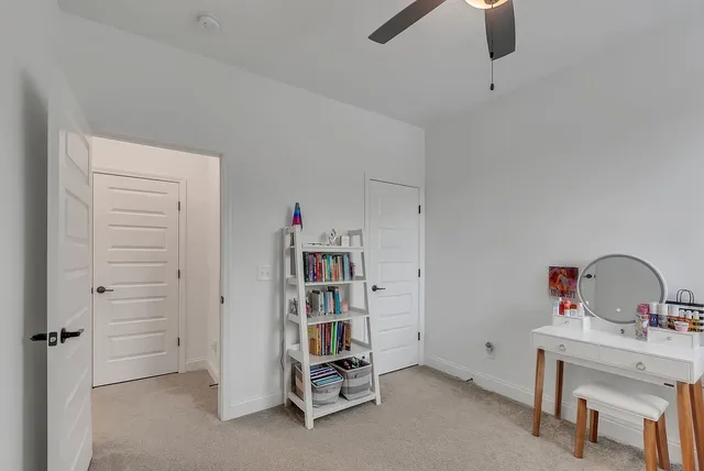 a bathroom with a double vanity sink mirror and