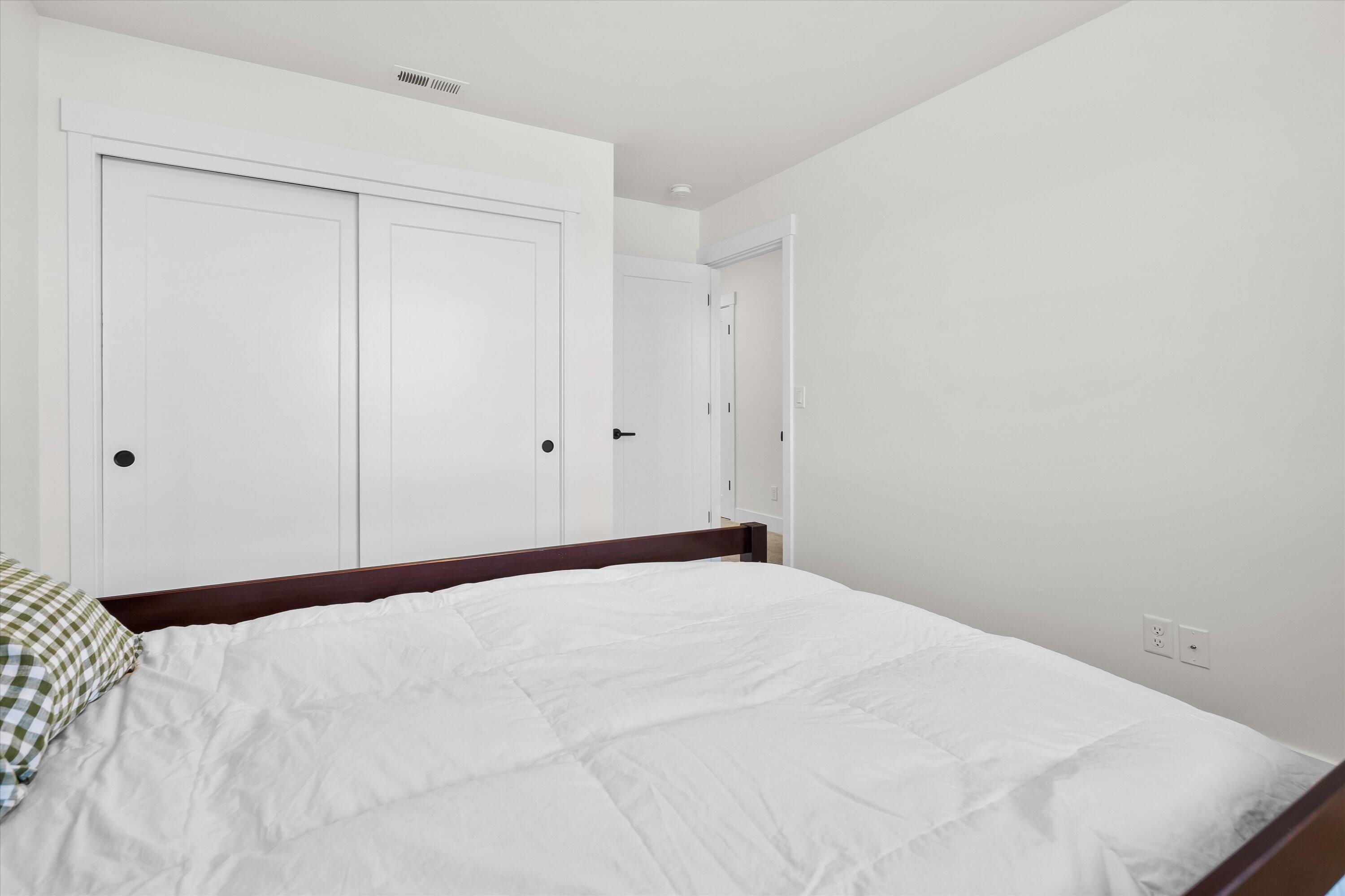 60903 Southeast Epic Place Bend, OR 97702 - Photo 30 of 48 a view of a bedroom with a bed