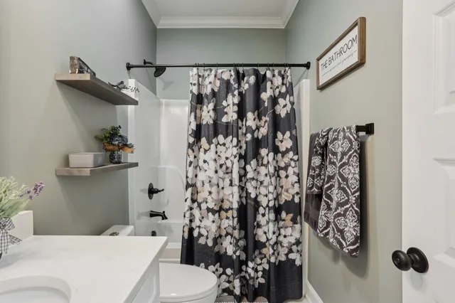 a view of pool with a yard