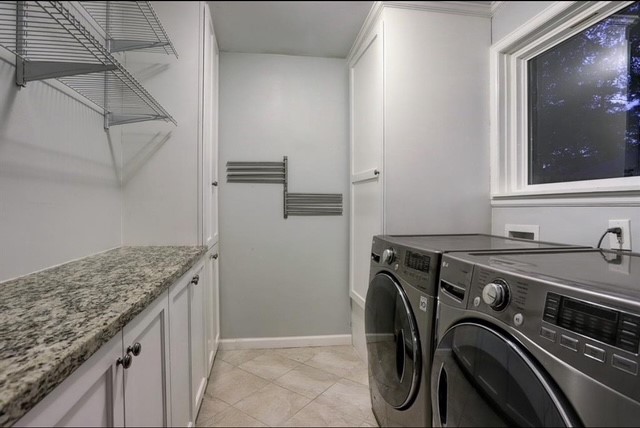 6022 Woodbrook Lane Houston, TX 77008 - Photo 15 of 20 a utility room with dryer and washer