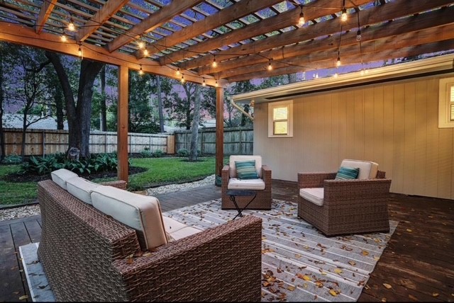 6022 Woodbrook Lane Houston, TX 77008 - Photo 19 of 20 a backyard of a house with seating space