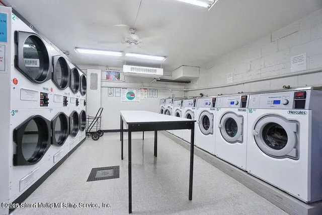 a view of a patio with furniture