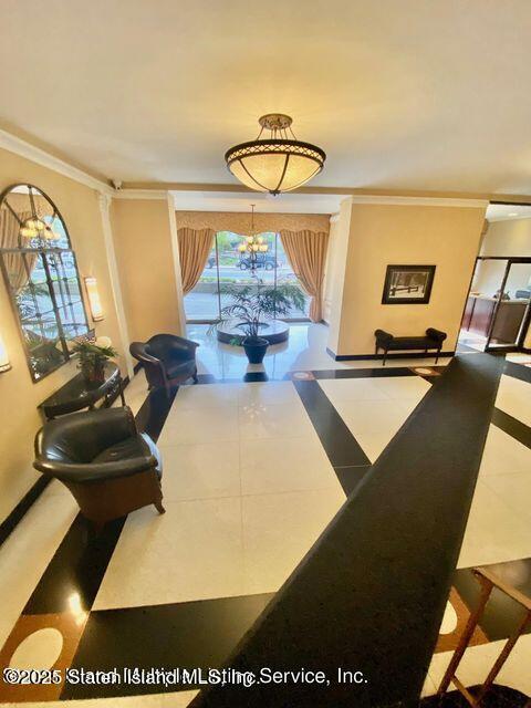 1000 Clove Road, Unit 3G Staten Island, NY 10301 - Photo 3 of 25 a living room with furniture and a table