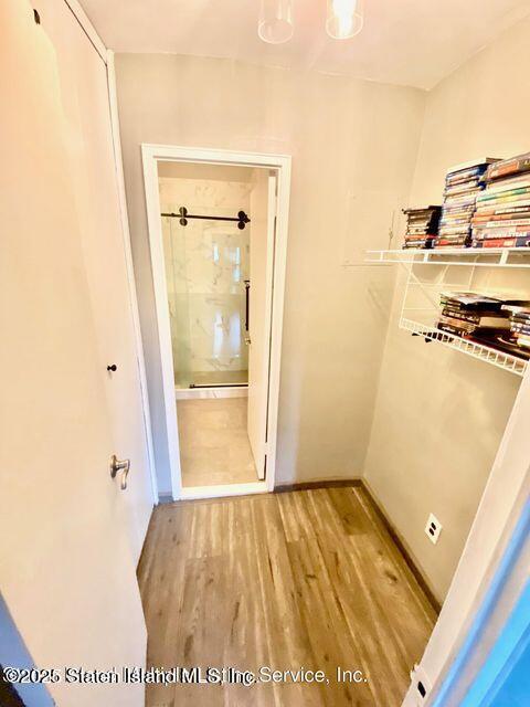 1000 Clove Road, Unit 3G Staten Island, NY 10301 - Photo 9 of 25 view of a room with wooden floor