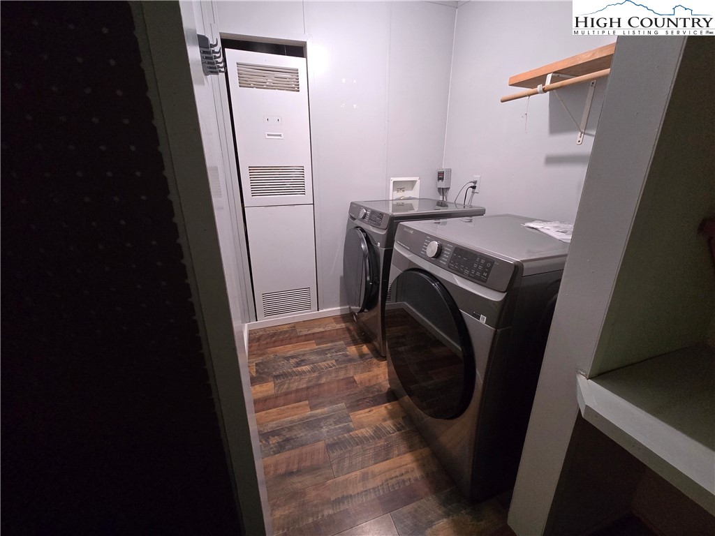 618 Rhymer Branch Road Deep Gap, NC 28618 - Photo 12 of 24 a utility room with dryer and washer