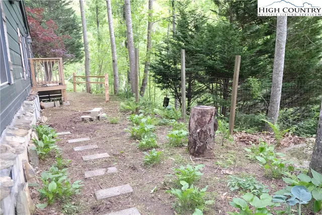 a garden view with a seating space