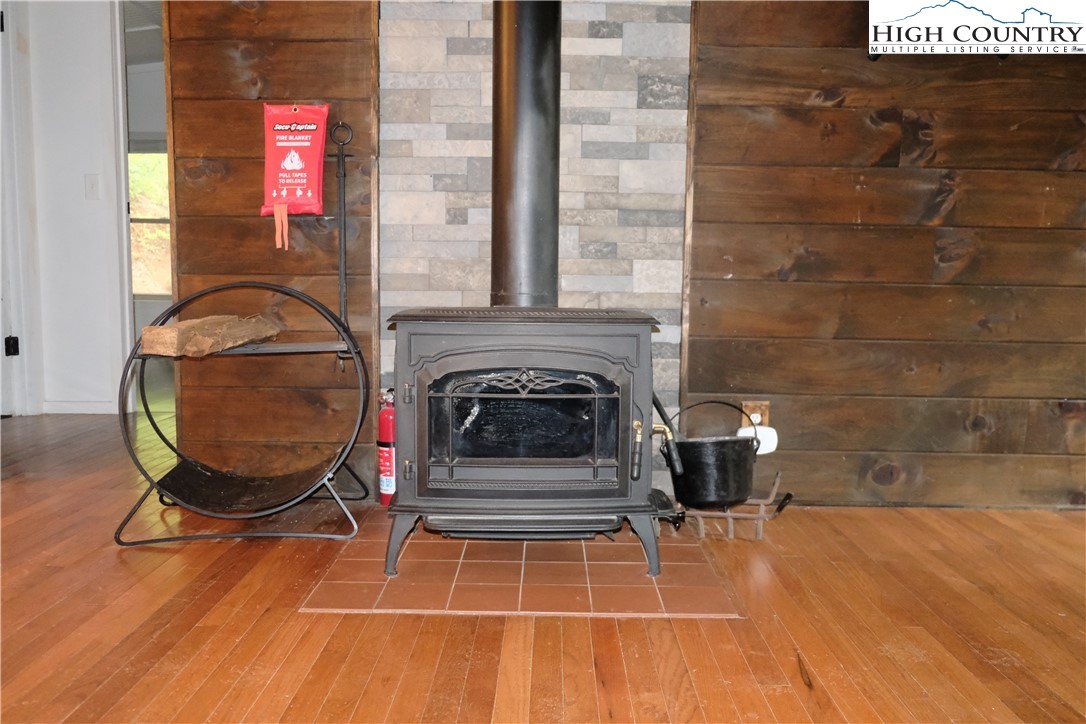 618 Rhymer Branch Road Deep Gap, NC 28618 - Photo 23 of 24 closeup of a livingroom with furniture and a fireplace