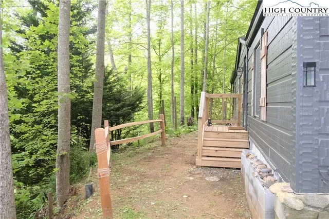 a view of a garden with stairs