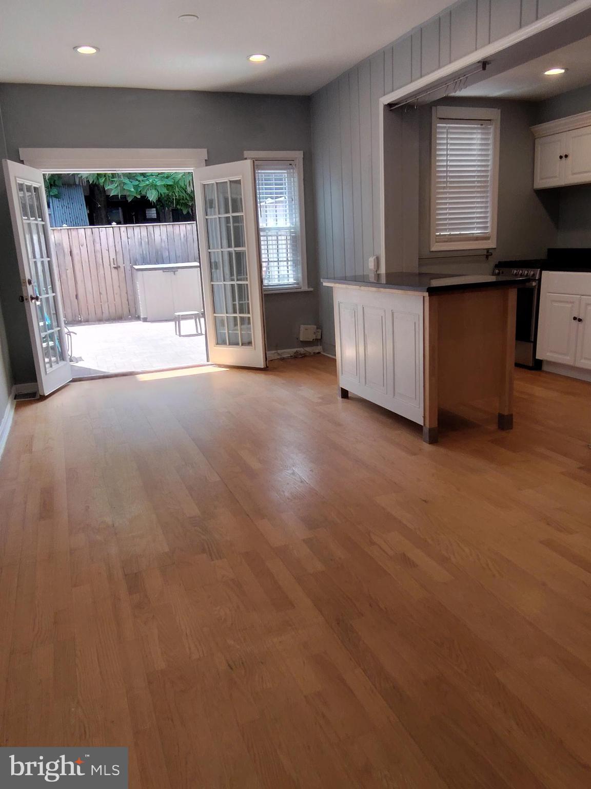 a view of kitchen with furniture and large window