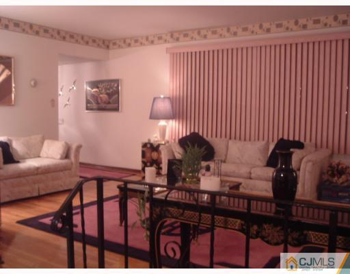 12 Roxy Avenue Edison, NJ 08820 - Photo 5 of 8 a view of a dining room with furniture