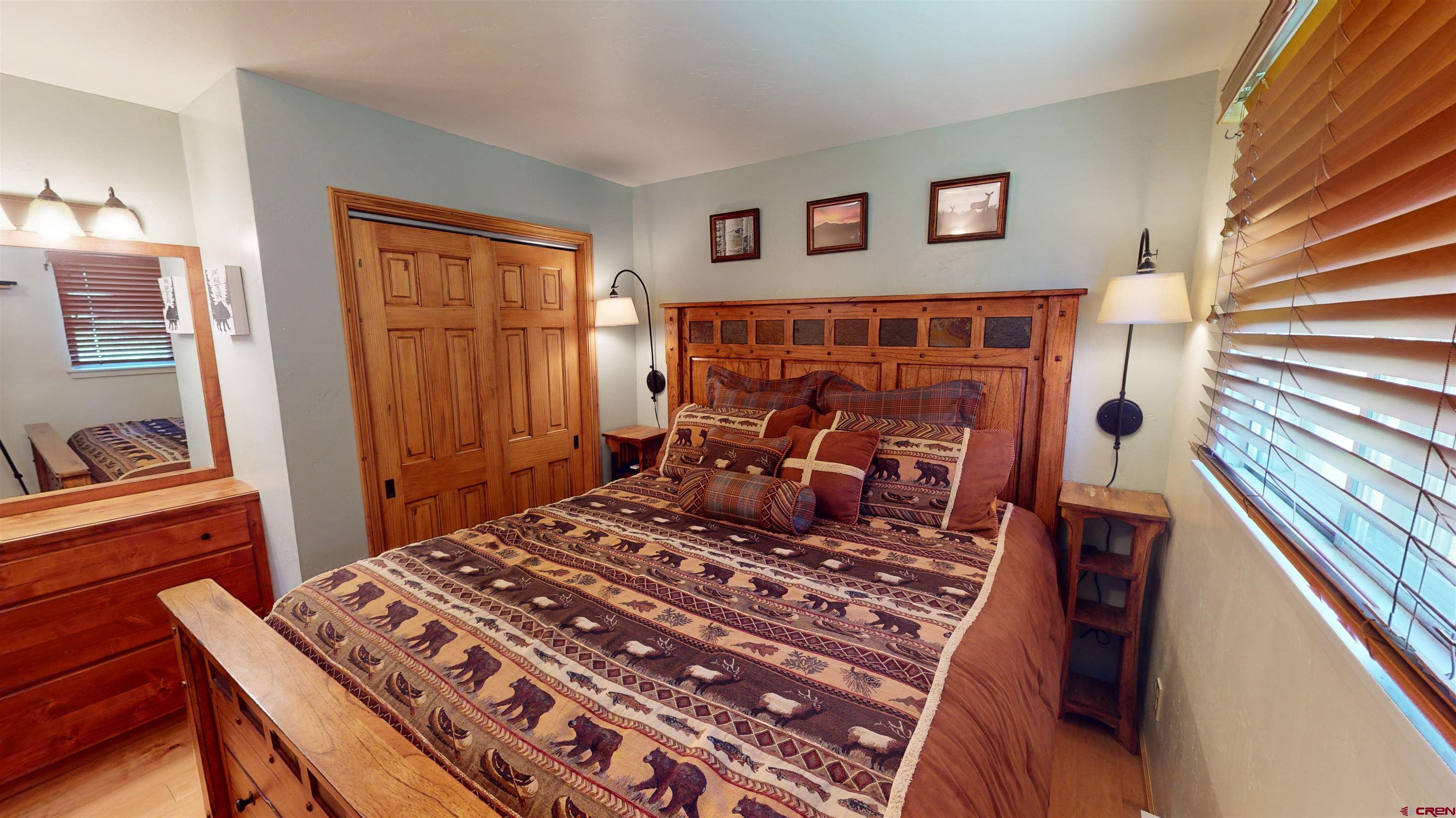 18 Crystal Road, Unit 3B Crested Butte, CO 81225 - Photo 13 of 20 a bed room with a bed and a window