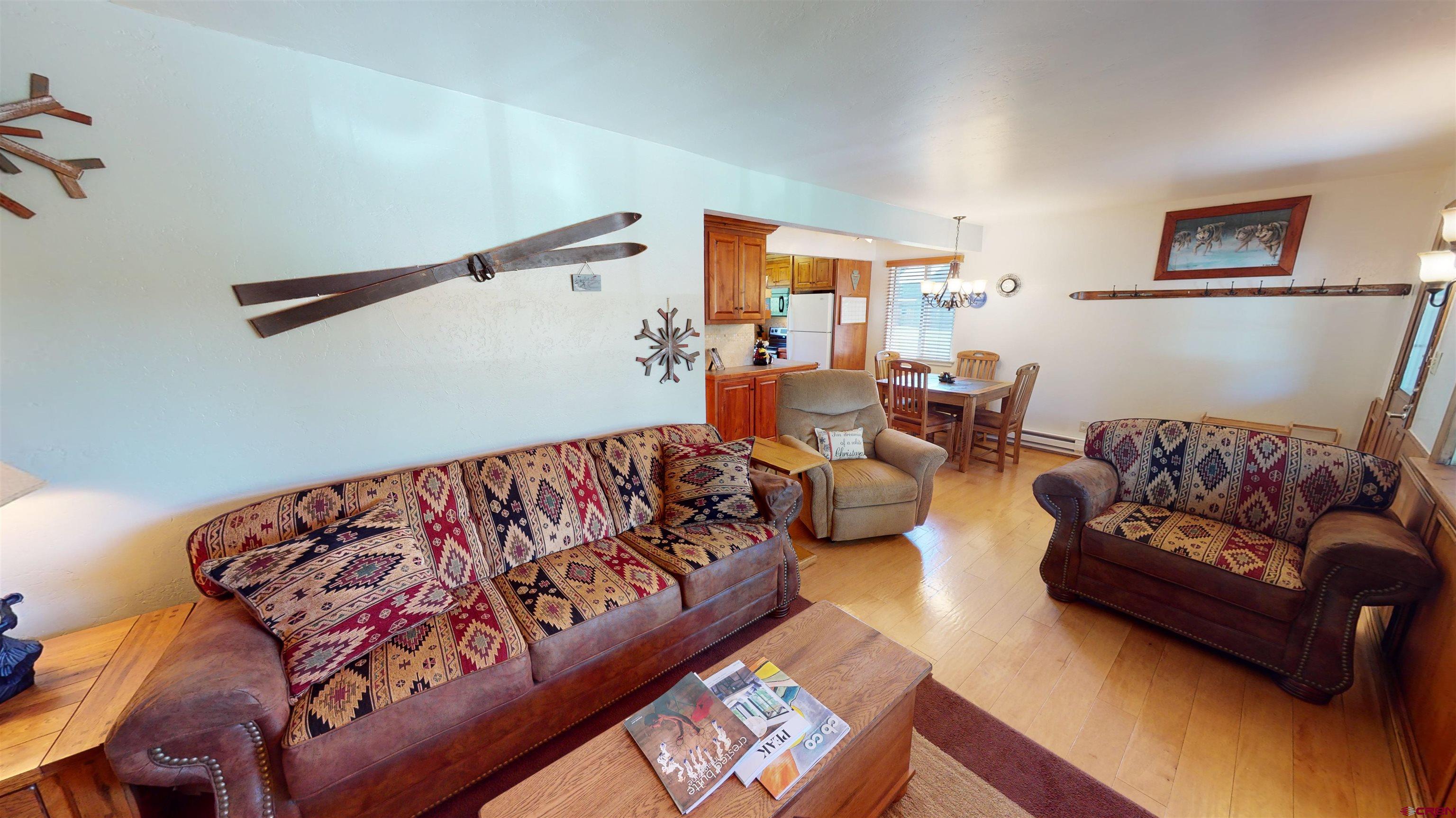 18 Crystal Road, Unit 3B Crested Butte, CO 81225 - Photo 9 of 20 a living room with furniture and a couch