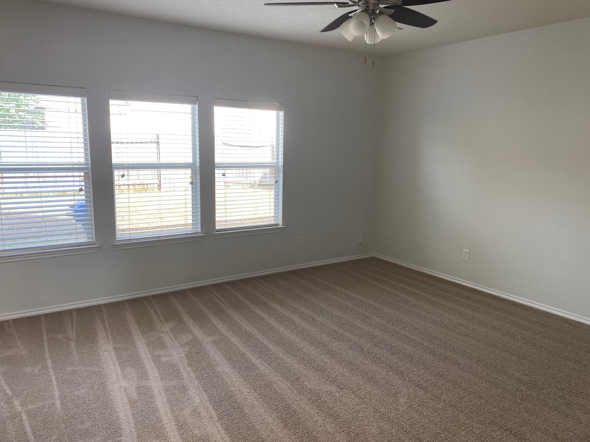21218 Branchport Drive Houston, TX 77095 - Photo 9 of 18 an empty room with a window