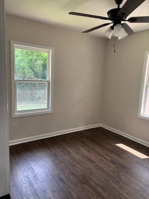 2349 Ousley Court Decatur, GA 30032 - Photo 16 of 21 a view of an empty room with wooden floor and a window