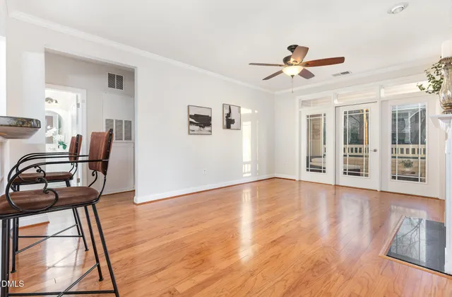 a view of a livingroom with furniture and wooden floor