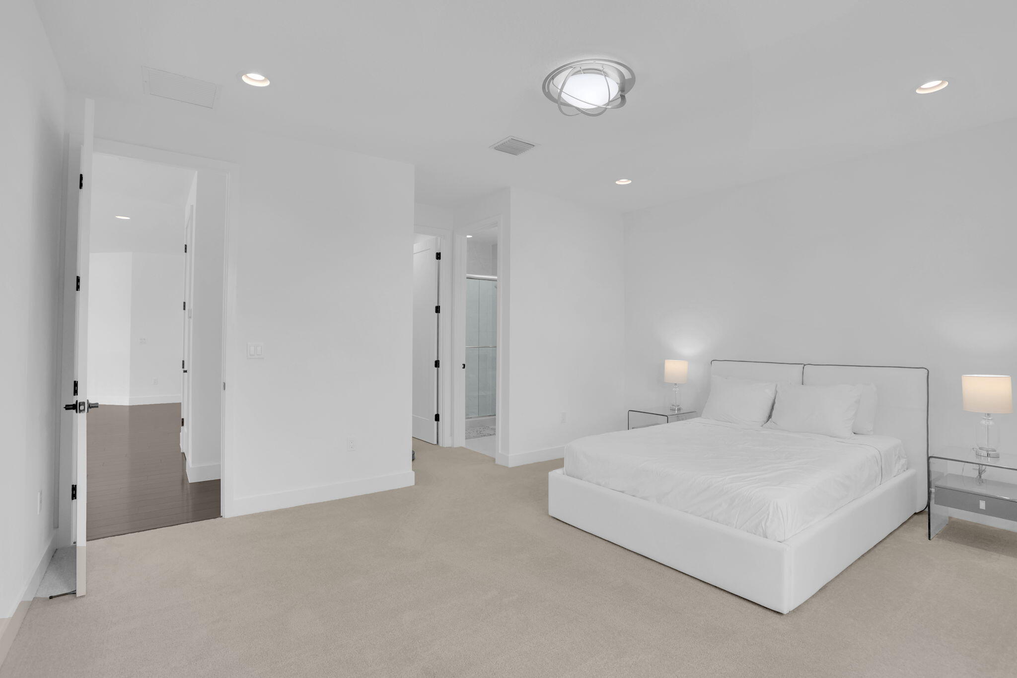 8115 Laurel Falls Drive Boca Raton, FL 33496 - Photo 41 of 74 a bedroom with a bed and a night lamp