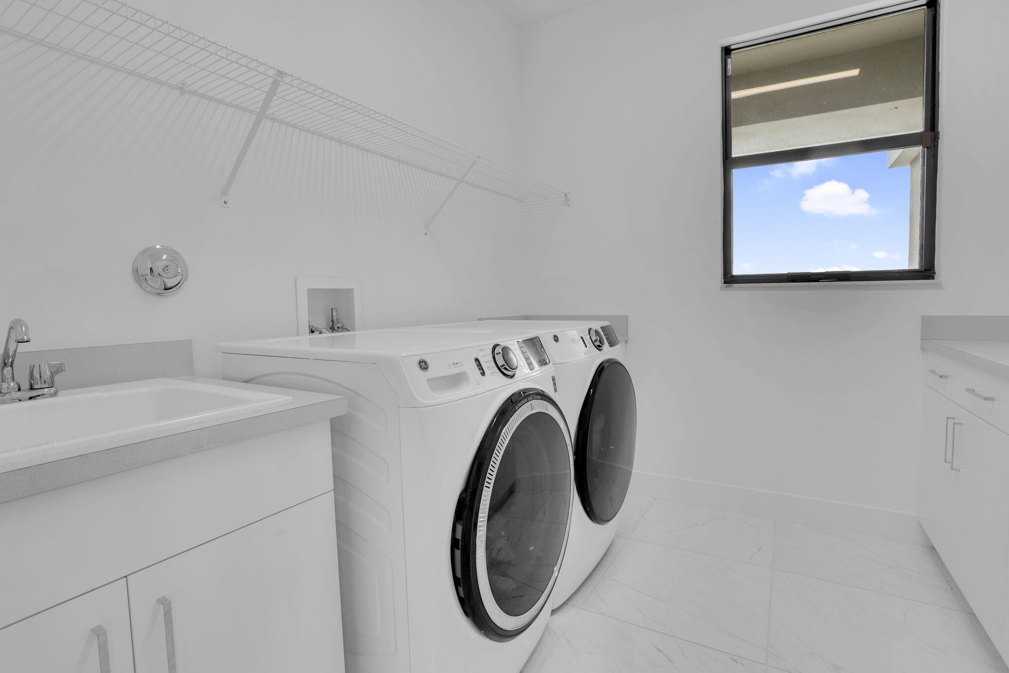 8115 Laurel Falls Drive Boca Raton, FL 33496 - Photo 44 of 74 a utility room with dryer and washer