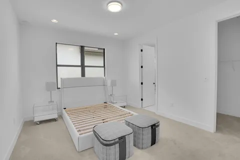 an aerial view of a house with yard