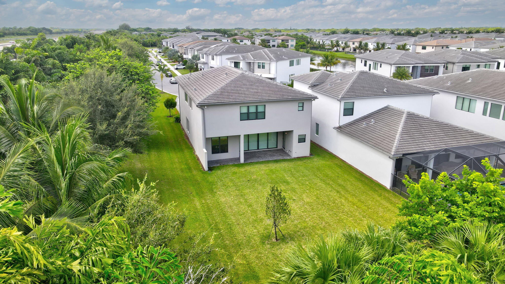 8115 Laurel Falls Drive Boca Raton, FL 33496 - Photo 5 of 74 an aerial view of a house with a big yard