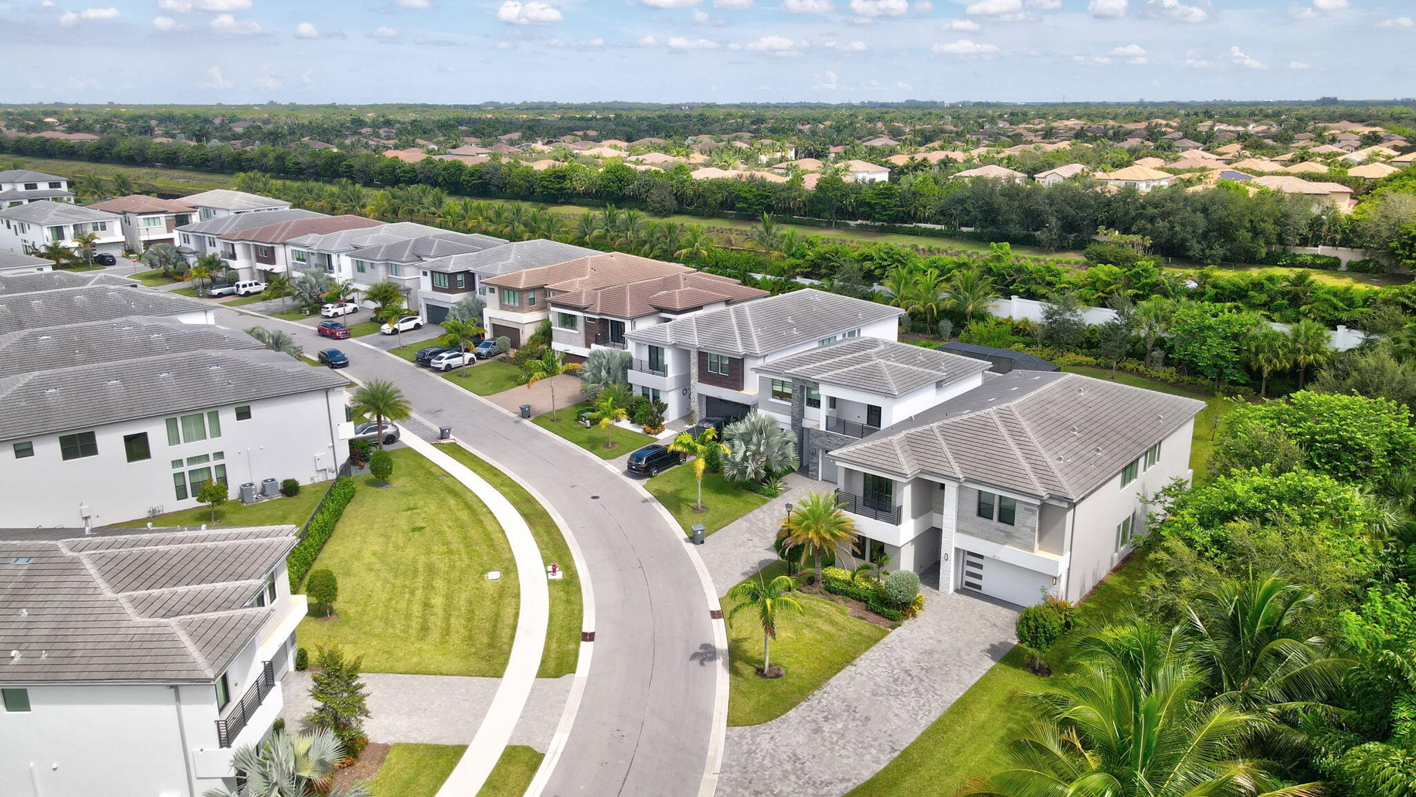 8115 Laurel Falls Drive Boca Raton, FL 33496 - Photo 54 of 74 an aerial view of residential houses with outdoor space and river