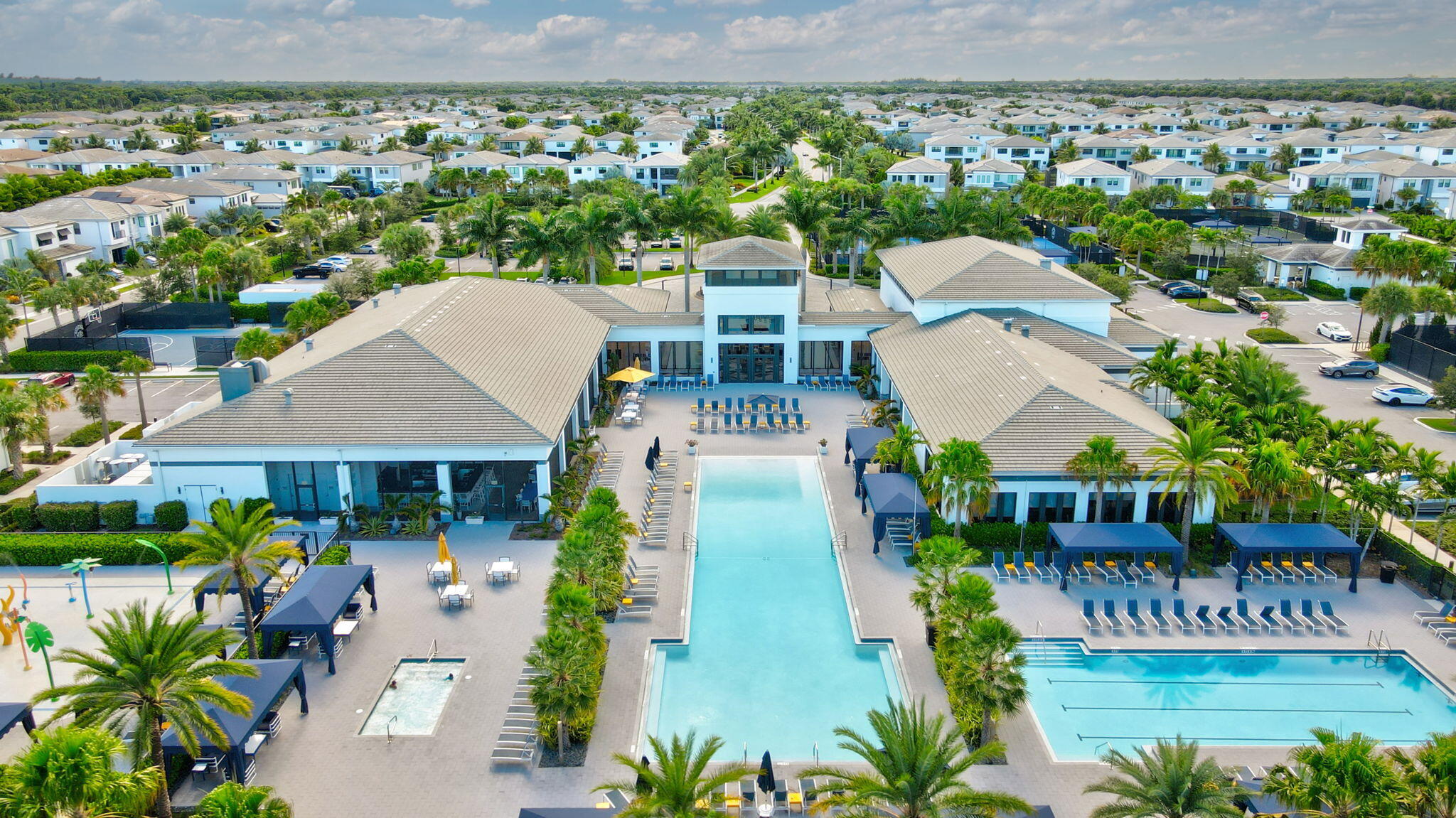 8115 Laurel Falls Drive Boca Raton, FL 33496 - Photo 58 of 74 an aerial view of a house with garden space and lake view