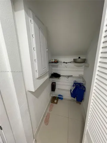 a view of storage and utility room