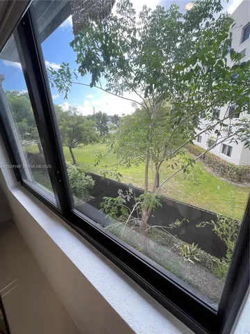 a view of a yard from a window