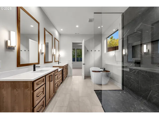 a large bathroom with a sink and a mirror