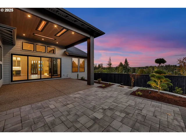 a view of a yard with an outdoor seating