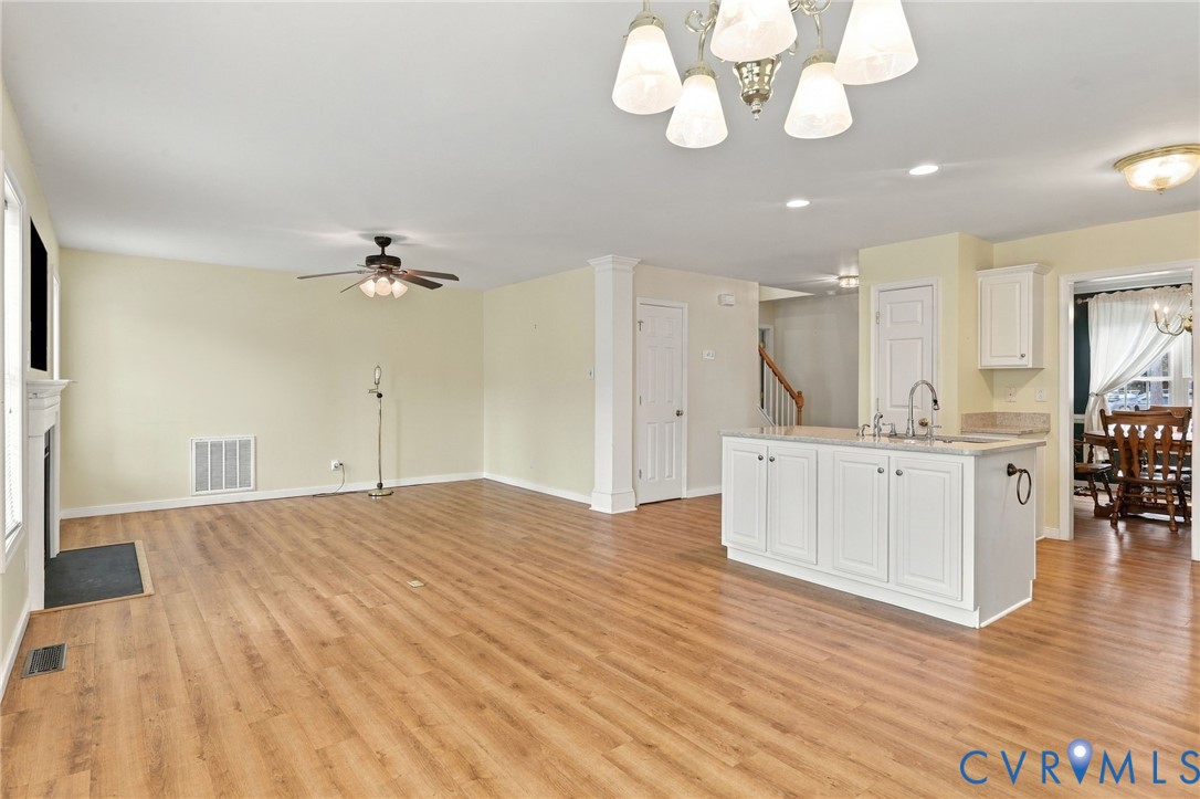 244 East Huntsman Road Sandston, VA 23150 - Photo 17 of 54 Wood-finish flooring throughout, white fireplace w