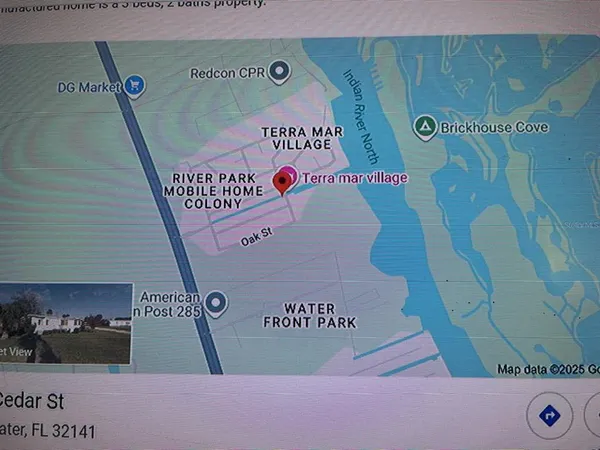 a kitchen with a refrigerator stove and white cabinets