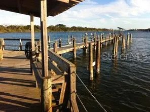 a stove top oven sitting inside of a kitchen