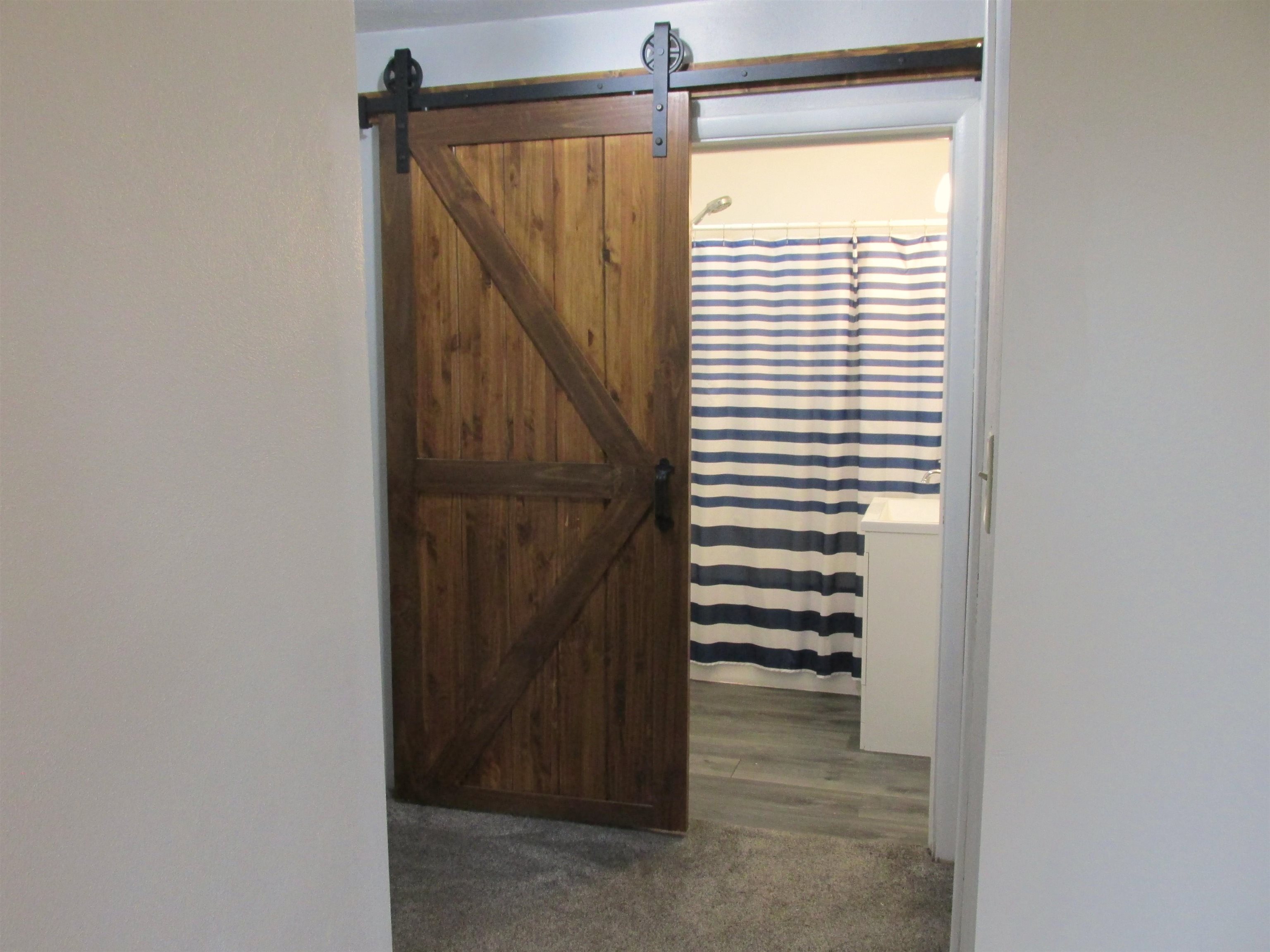 926 West 2nd Street Byron, IL 61010 - Photo 12 of 20 a view of a room with a window