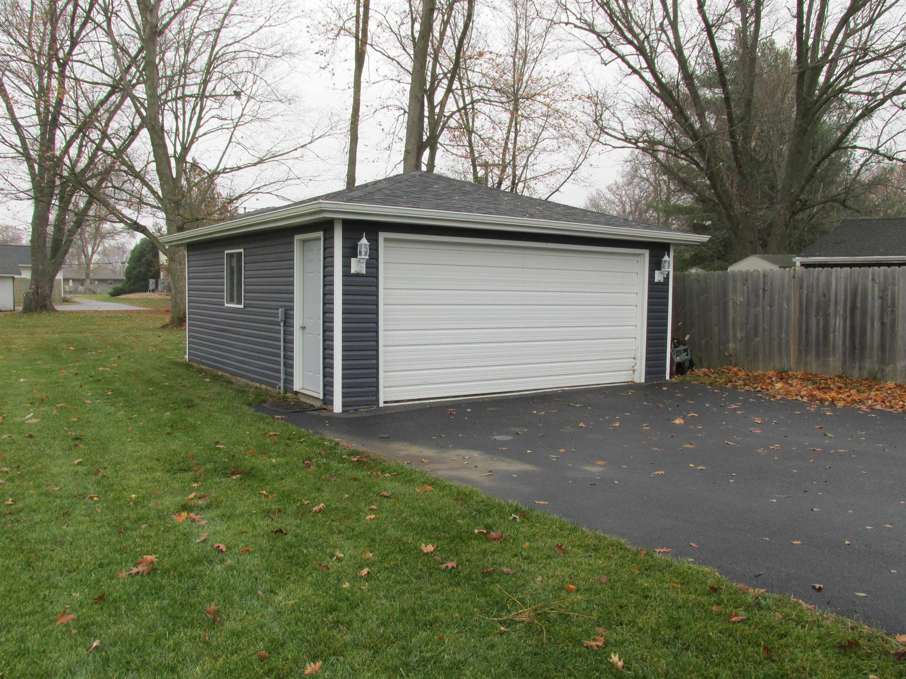 926 West 2nd Street Byron, IL 61010 - Photo 17 of 20 a front view of house with yard and trees