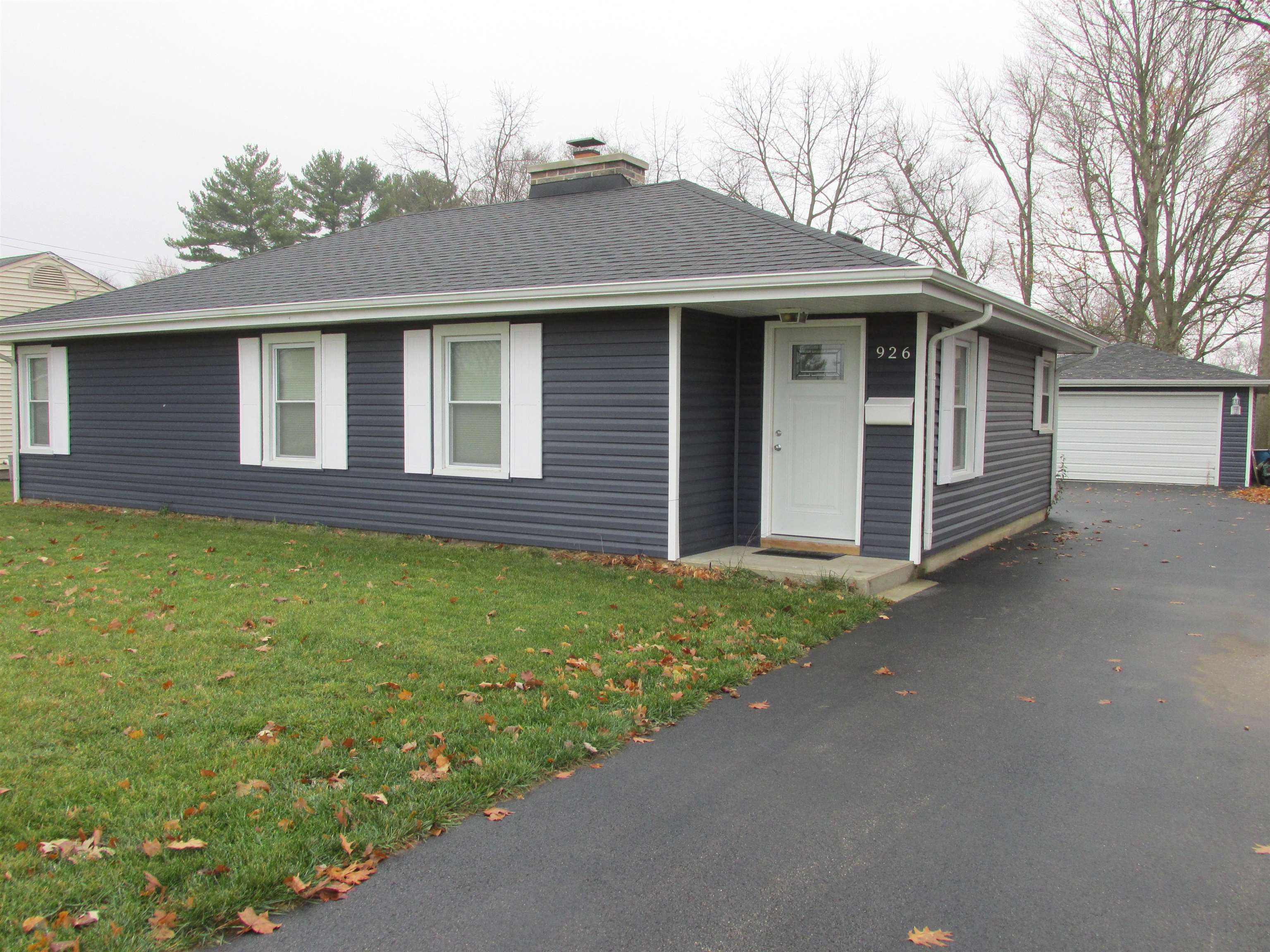 926 West 2nd Street Byron, IL 61010 - Photo 19 of 20 a front view of a house with a garden