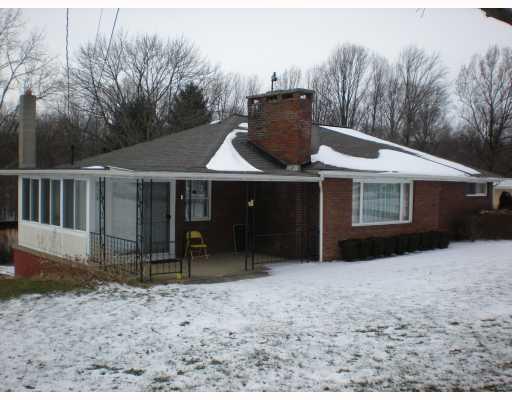 295 Lewis Road Greensburg, PA 15601 - Photo 4 of 18 Other. THIS IS THE VIEW OF THE COVERED FRONT PORCH & THE ENCLOSED PORCH.