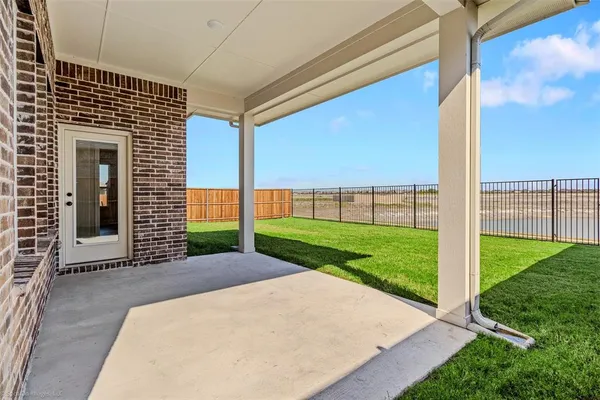 a view of a backyard with garden