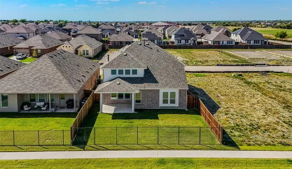 a view of a house with a swimming pool